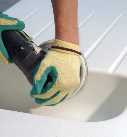 polishing a sink